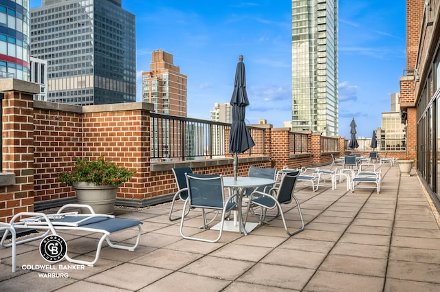view of patio featuring a view of city