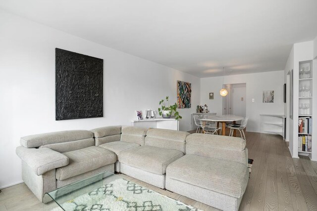 living room with wood finished floors