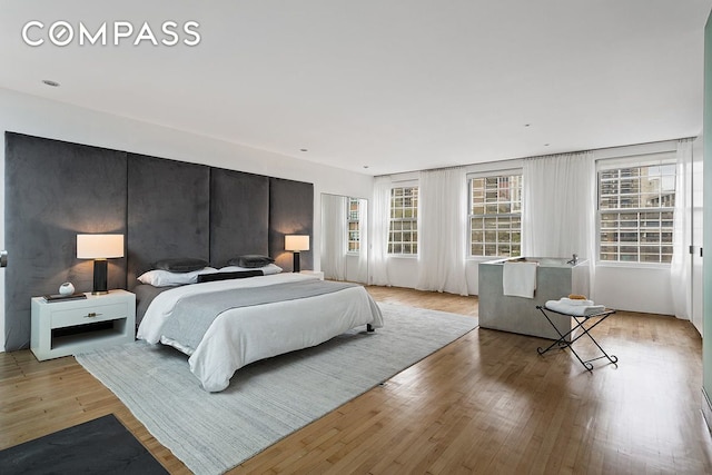 bedroom featuring light wood-type flooring