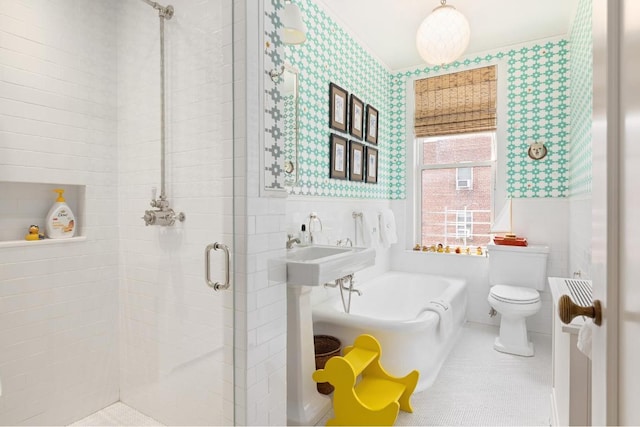 bathroom with toilet, tile patterned flooring, and shower with separate bathtub