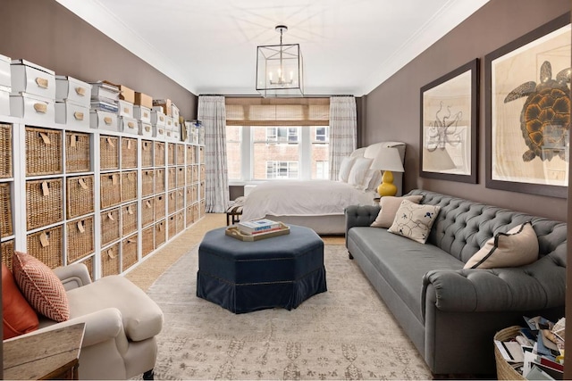 bedroom with crown molding and a notable chandelier