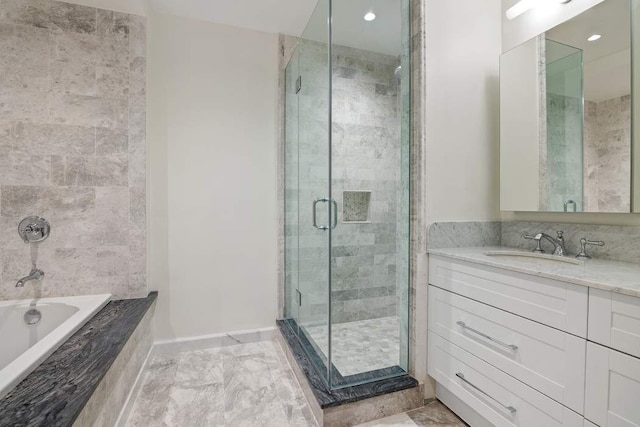 full bathroom featuring baseboards, a tub, a shower stall, recessed lighting, and vanity
