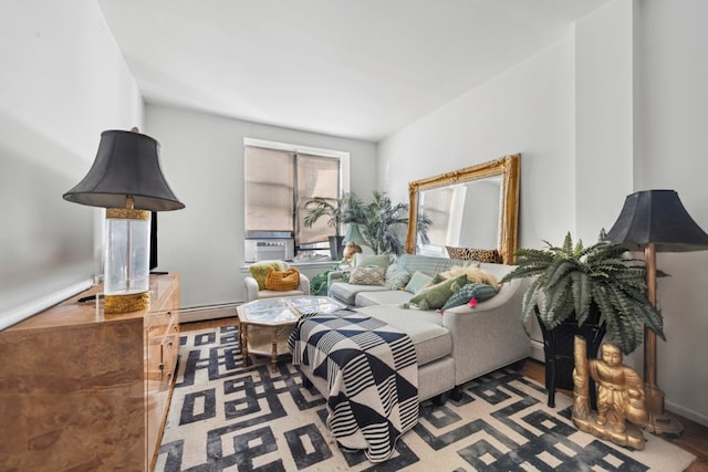 living room featuring baseboard heating, hardwood / wood-style floors, and cooling unit