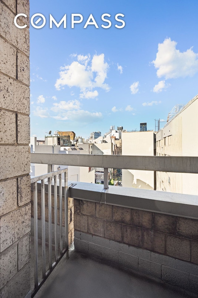 view of patio with a balcony