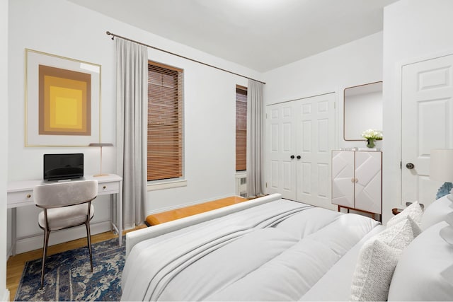 100 W 88th St Unit 5C, New York City, NY 10024 - bedroom featuring wood finished floors, a closet, and an office area