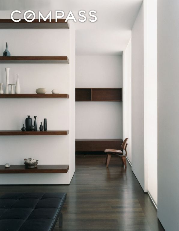 corridor featuring dark hardwood / wood-style floors