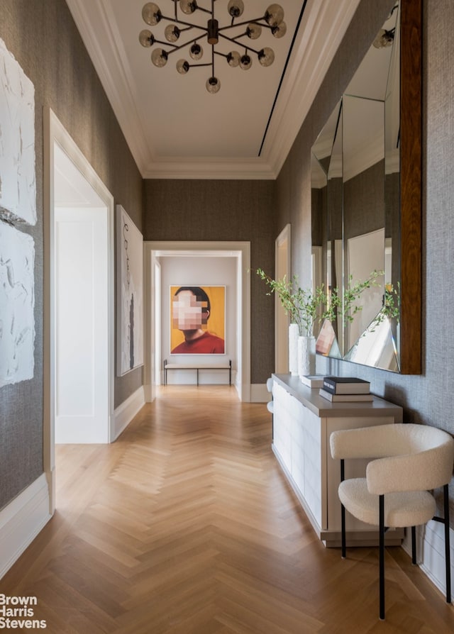 hallway featuring wallpapered walls, crown molding, and baseboards