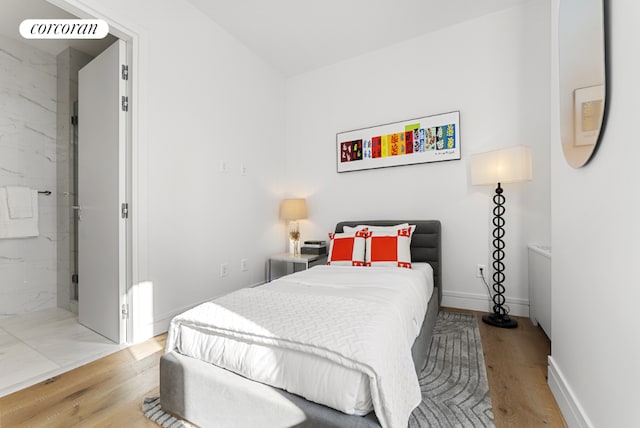 bedroom featuring light hardwood / wood-style flooring