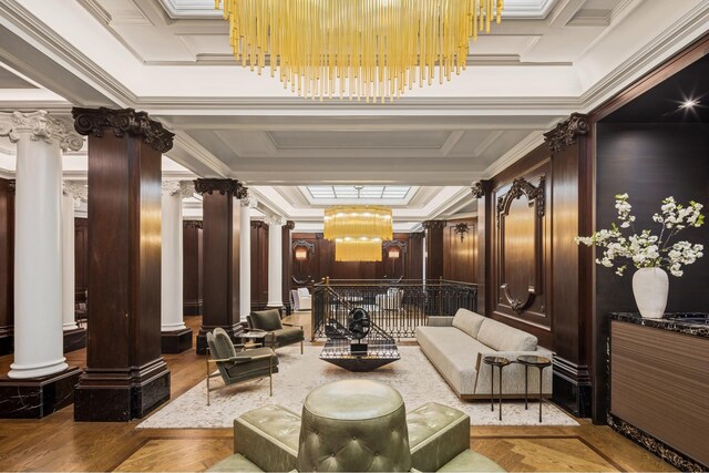 building lobby featuring crown molding