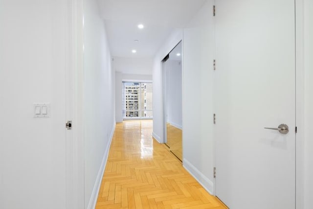 hallway featuring light parquet floors