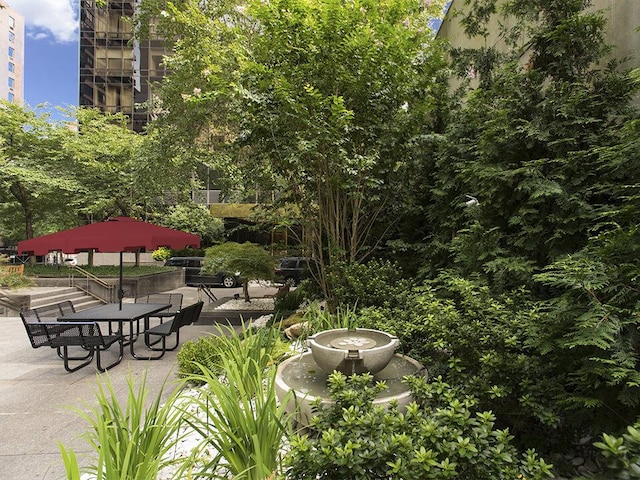 view of community with a patio area