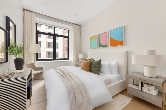 bedroom featuring light hardwood / wood-style floors