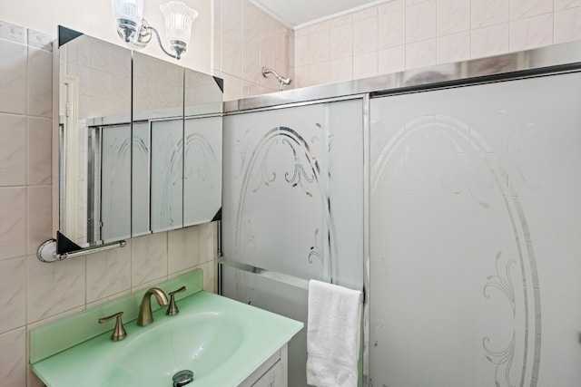 bathroom featuring vanity, tile walls, backsplash, and walk in shower