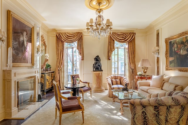 sitting room featuring crown molding, a high end fireplace, and a chandelier