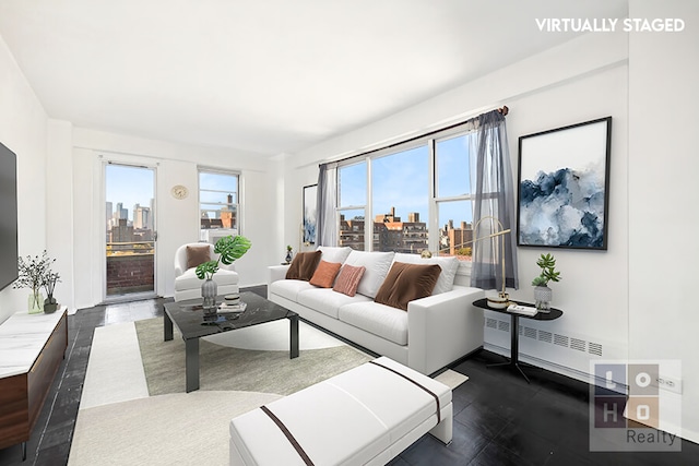 living room featuring plenty of natural light and a city view