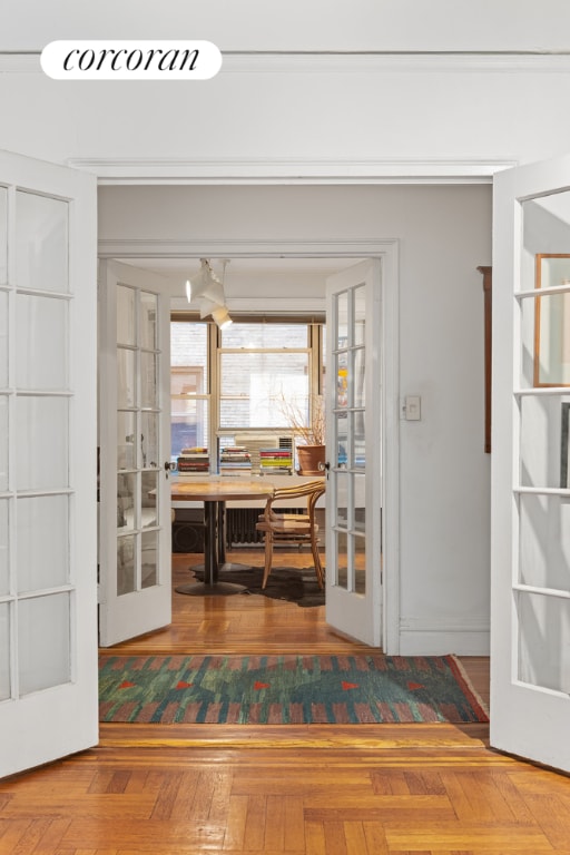 interior space featuring parquet flooring and french doors