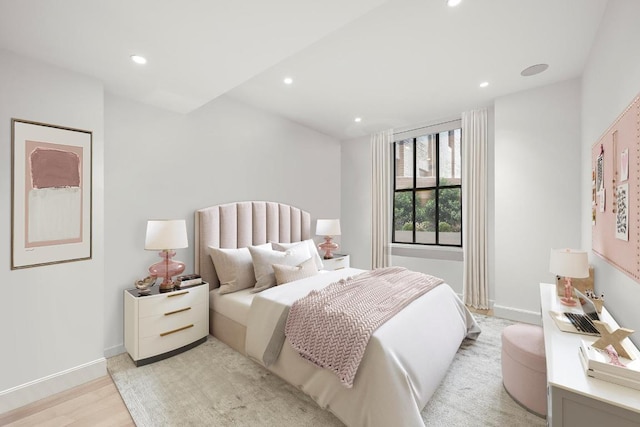 bedroom featuring light hardwood / wood-style floors