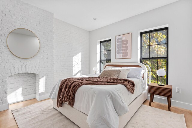 bedroom with light parquet floors