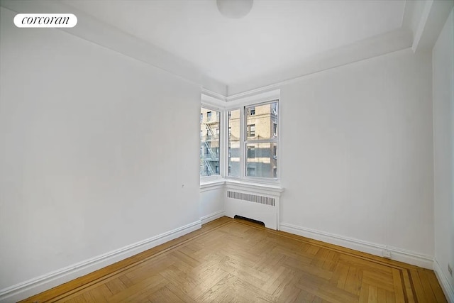 250 Cabrini Blvd Unit 5C, New York City, NY 10033 - empty room with radiator and baseboards