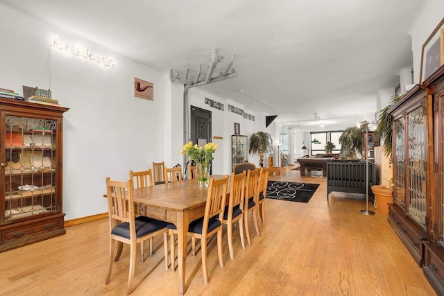 50 Pine St Unit 10, New York City, NY 10005 - dining space featuring light wood finished floors