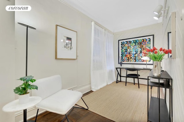 sitting room featuring parquet floors