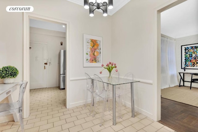 dining room with an inviting chandelier and light tile patterned floors