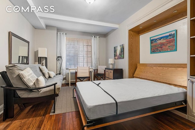 bedroom featuring dark hardwood / wood-style floors