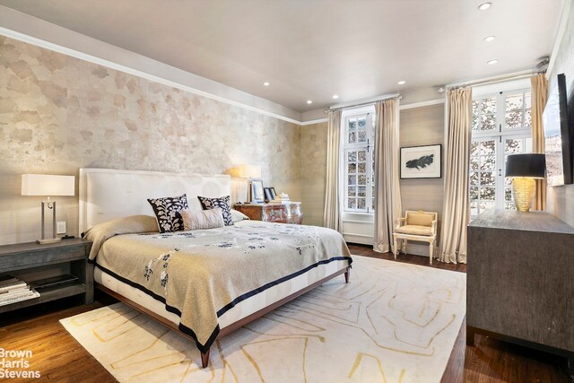 bedroom featuring wood-type flooring