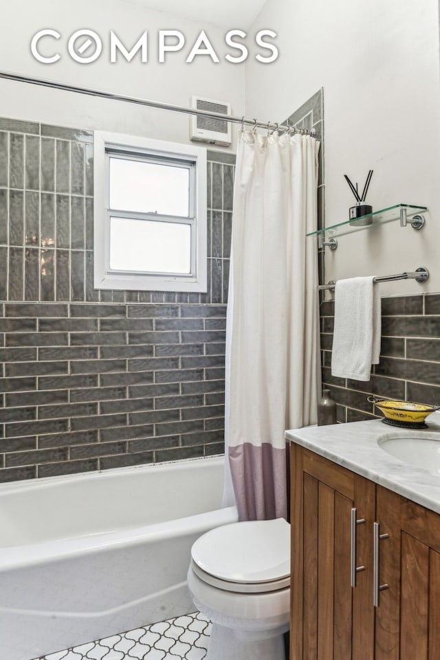 full bath with decorative backsplash, toilet, shower / bathtub combination with curtain, tile patterned flooring, and vanity