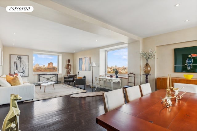 dining area with hardwood / wood-style flooring and plenty of natural light