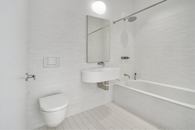 bathroom with hardwood / wood-style flooring