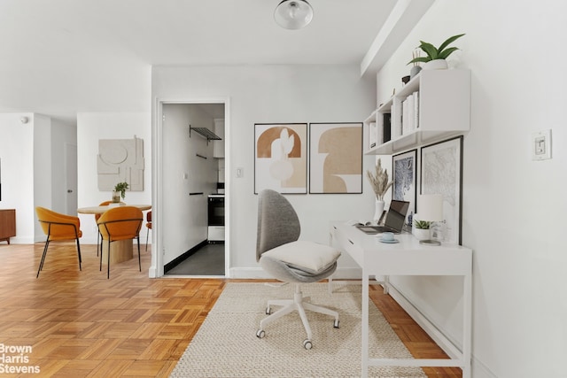 office area featuring baseboards