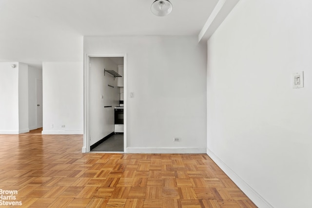 interior space featuring baseboards