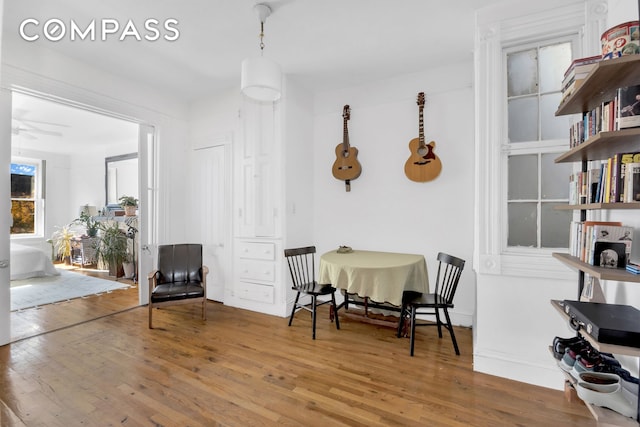 sitting room featuring wood finished floors