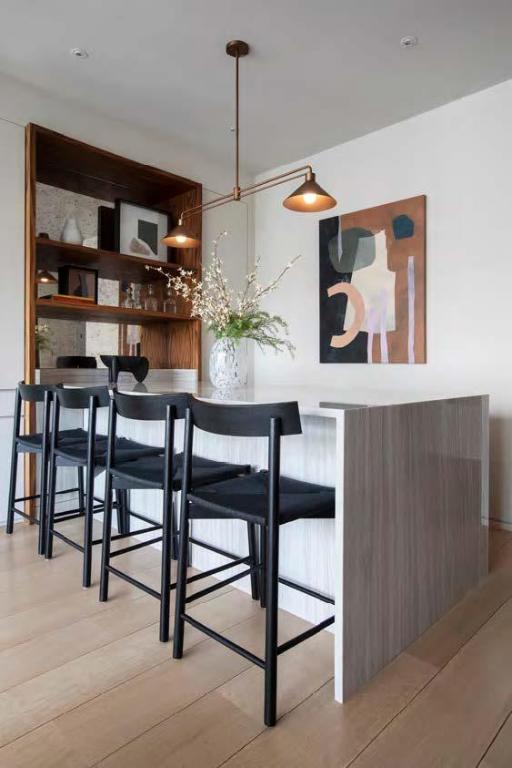 bar featuring light hardwood / wood-style floors