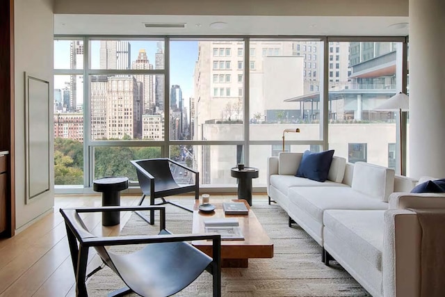 sunroom / solarium with a view of skyline