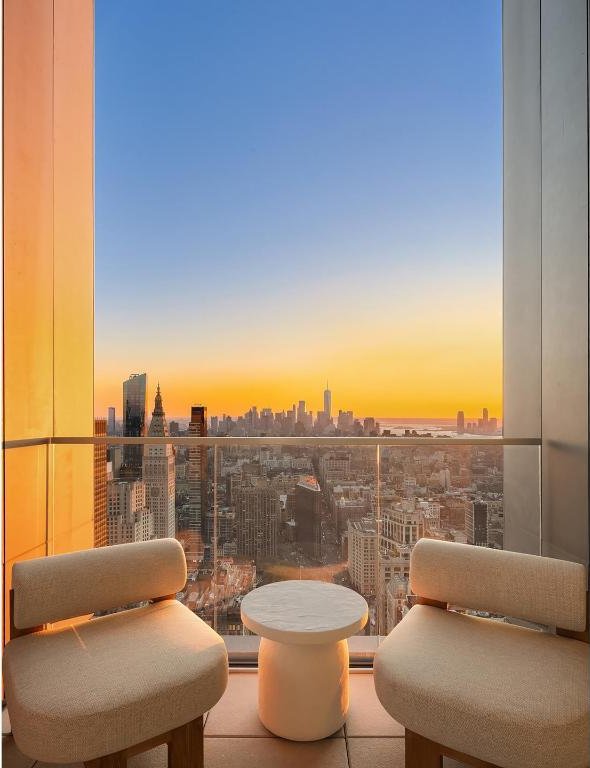 view of balcony at dusk