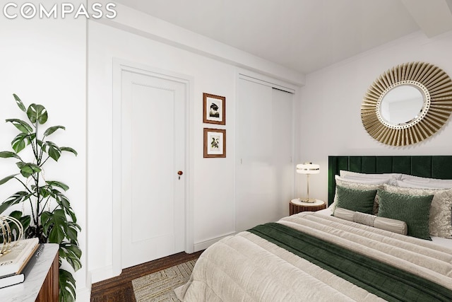 bedroom featuring dark hardwood / wood-style floors