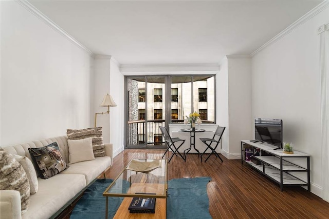 living room with crown molding and dark hardwood / wood-style flooring