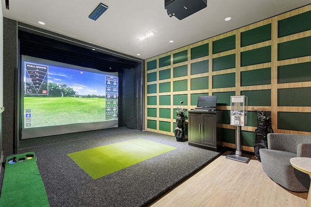 recreation room featuring golf simulator and carpet flooring