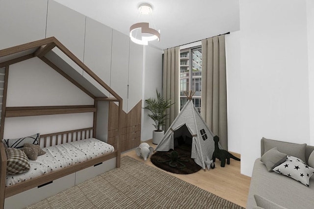 bedroom with light wood-type flooring