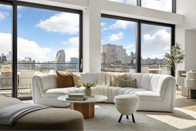 sunroom / solarium featuring a view of city