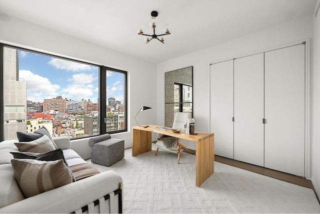 office featuring a chandelier and a city view