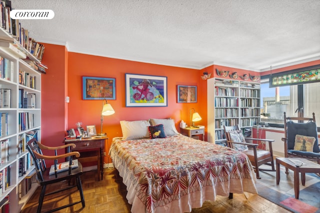 bedroom with a textured ceiling, ornamental molding, and parquet flooring