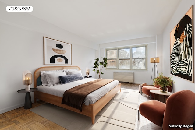 205 E 63rd St Unit 9B, New York City, NY 10065 - bedroom featuring radiator and baseboards