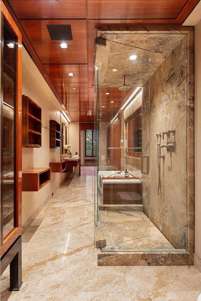 61 E 80th St, New York City, NY 10075 - full bath with marble tiled floors, a stall shower, vanity, and wood ceiling
