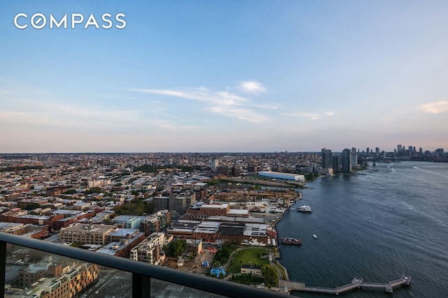 aerial view with a water view and a city view