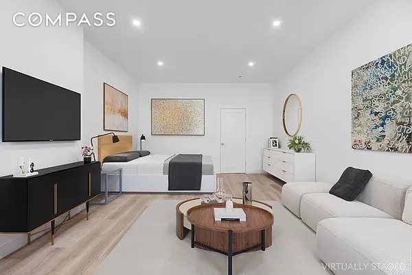 living room with recessed lighting and light wood-style flooring