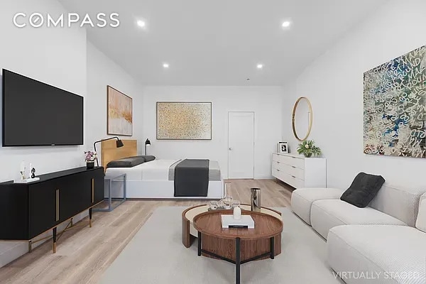 living room featuring recessed lighting and light wood-style flooring
