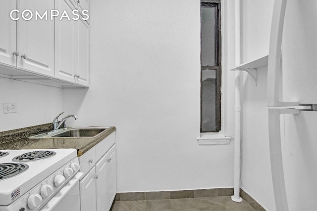 kitchen with white cabinetry, sink, and white range with electric stovetop